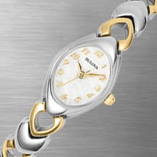 Bulova Ladies' Classic Two-Tone Stainless Steel 3-Hand Quartz, White Patterned Dial Style: 98V02