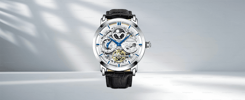 Stuhrling Mens Automatic Dress Watch Stainless Steel with Automatic Skeleton with Duel Time AM/PM Indicator