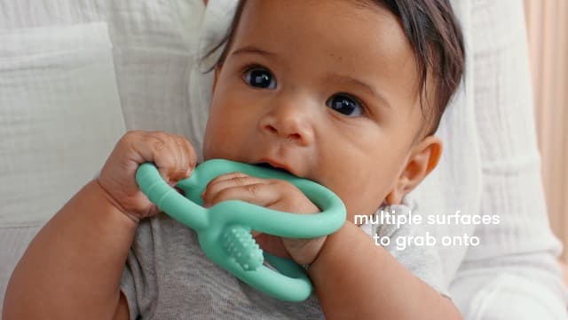Frida Baby Get-A-Grip Silicone Teether for Teething Pain Relief, BPA-Free Food-Grade Teething Toys for Infant Baby Newborn 0-6, 12, 18 Months, Easy-Grip Teether Ring, PVC-Free, Pink