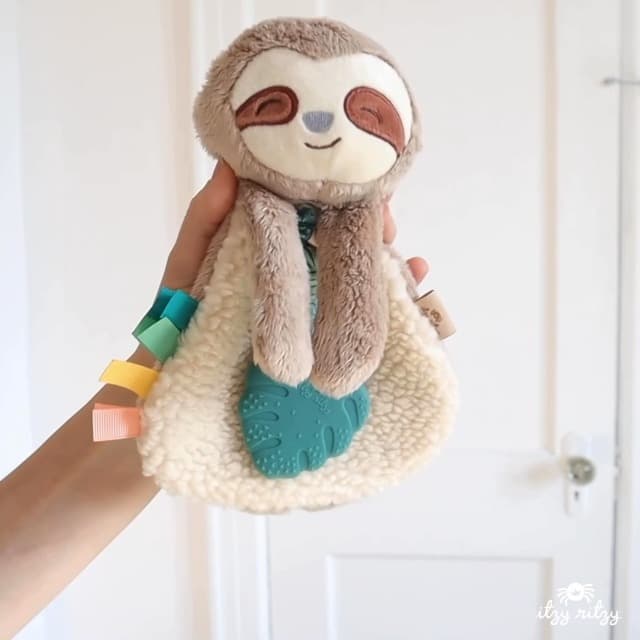 Itzy Ritzy - Itzy Lovey Including Teether - Baby Lovey with Teether, Textured Ribbons & Dangle Arms - Features Crinkle Sound, Sherpa Fabric and Minky Plush (Sloth)