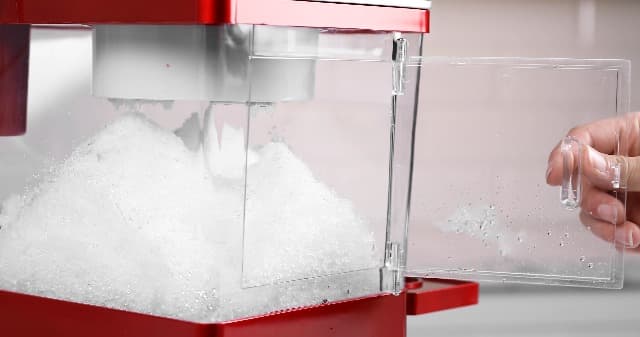 Nostalgia Snow Cone Shaved Ice Machine - Retro Table-Top Slushie Machine Makes 20 Icy Treats - Includes 2 Reusable Plastic Cups & Ice Scoop - Retro Red