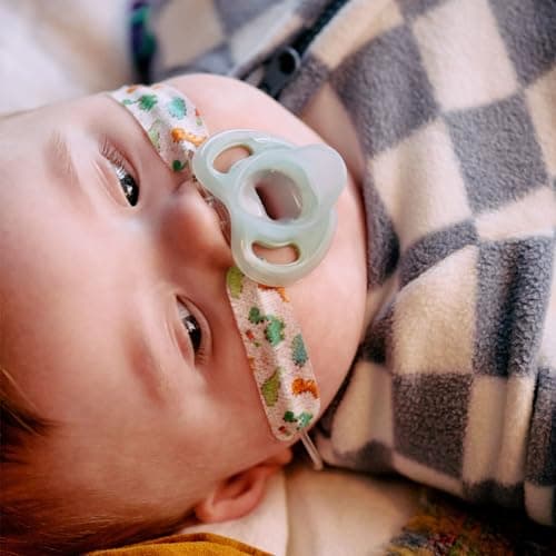 Tommee Tippee Ultra-Light Silicone Pacifier, 0-6 Months, Symmetrical One-Piece Design, BPA-Free Silicone Binkies, Clear/Blue/Green, Pack of 4