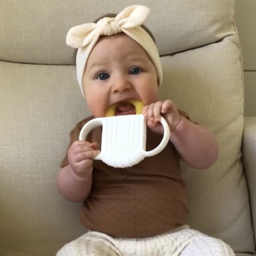 Frida Baby Silicone Teething Toys, 4-in-1 Teether for Babies & Infants, Teething Relief for 0-18 Months, Not-Too-Cold-to-Hold Baby Teether, BPA-Free