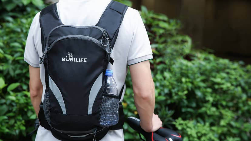 Bicycle Cycling Backpack - Water Resistant Biking and Bike Commuter Lightweight Backpack with Helmet Mesh Holder, Men and Women