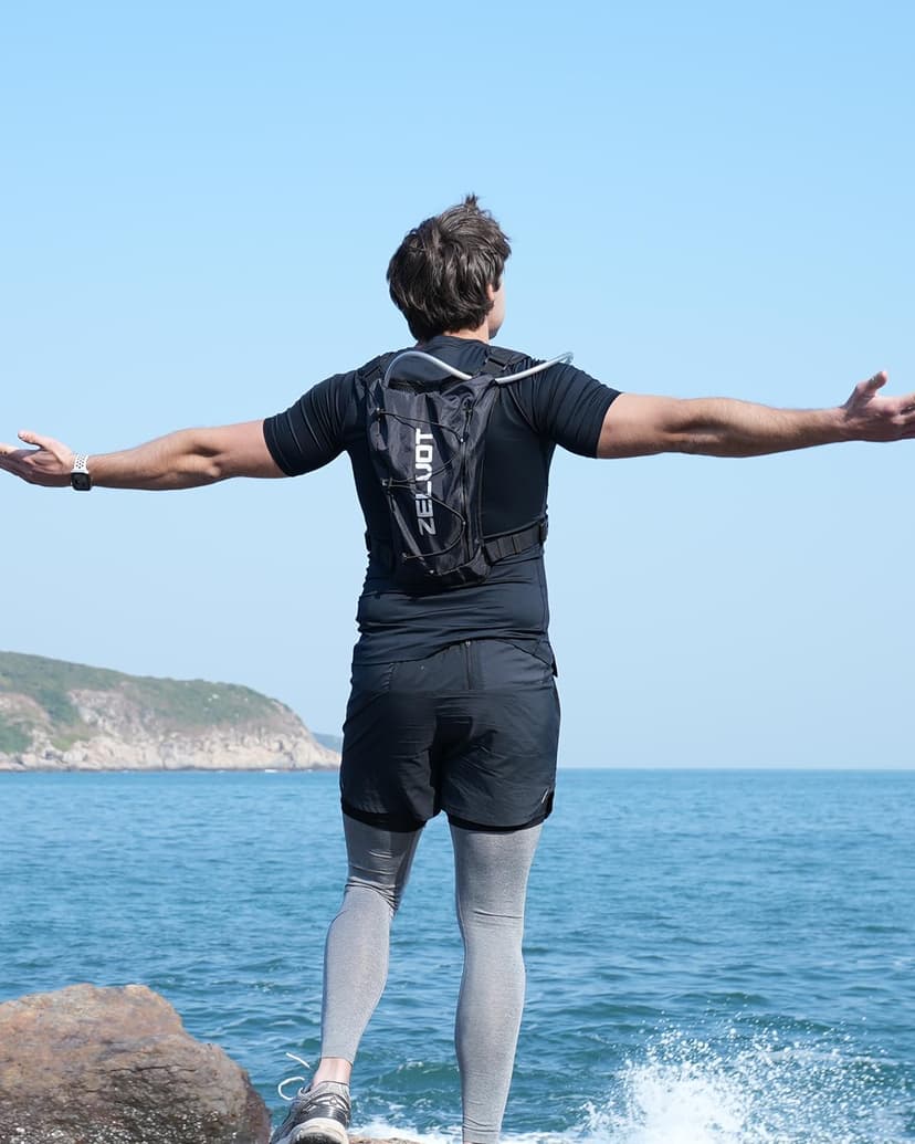 Running Vest with 2L Water Bladder, Hydration Backpack, USA Original Patent, Lightweight Hydration Pack with Gear Holder, Reflective Chest Pack for Men Women for Marathon