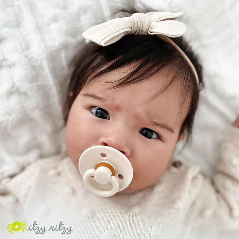 Itzy Ritzy Natural Rubber Newborn Pacifiers (Set of 2) – Baby Pacifiers with Cherry-Shaped Nipple & Large Air Holes for Added Safety; Set of 2 Binkies in Coconut & Toast (Ages 0 – 6 Months)