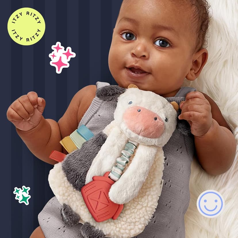 Baby Lovey With Soft Sherpa, Plush Minky, Silicone Teether, Crinkle Sounds, Textured Ribbons, and Interactive Dangle Arms Itzy Ritzy Lovey Including Teether, Teething Relief, 0 Months & Up (Cow) B0CQRVXT68