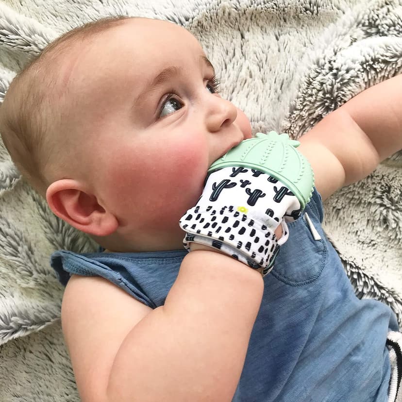 Itzy Ritzy Silicone Teething Mitt - Soothing Infant Teething Mitten with Adjustable Strap, Crinkle Sound & Textured Silicone to Soothe Sore & Swollen Gums - For Ages 3 Months & Up (Cactus)