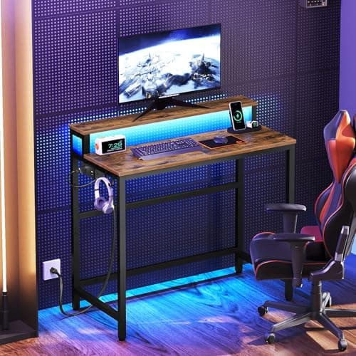 YATINEY Small Computer Desk with Charging Station and LED Lights, Gaming Desk with Monitor Stand, 2-Tier Home Office Desk with 4 Side Hooks, for Living Room, Home Office, Rustic Brown DN01UDBRY2