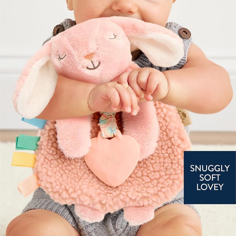 Itzy Ritzy - Itzy Lovey Including Teether - Baby Lovey with Teether, Textured Ribbons & Dangle Arms - Features Crinkle Sound, Sherpa Fabric and Minky Plush (Pink Bunny)