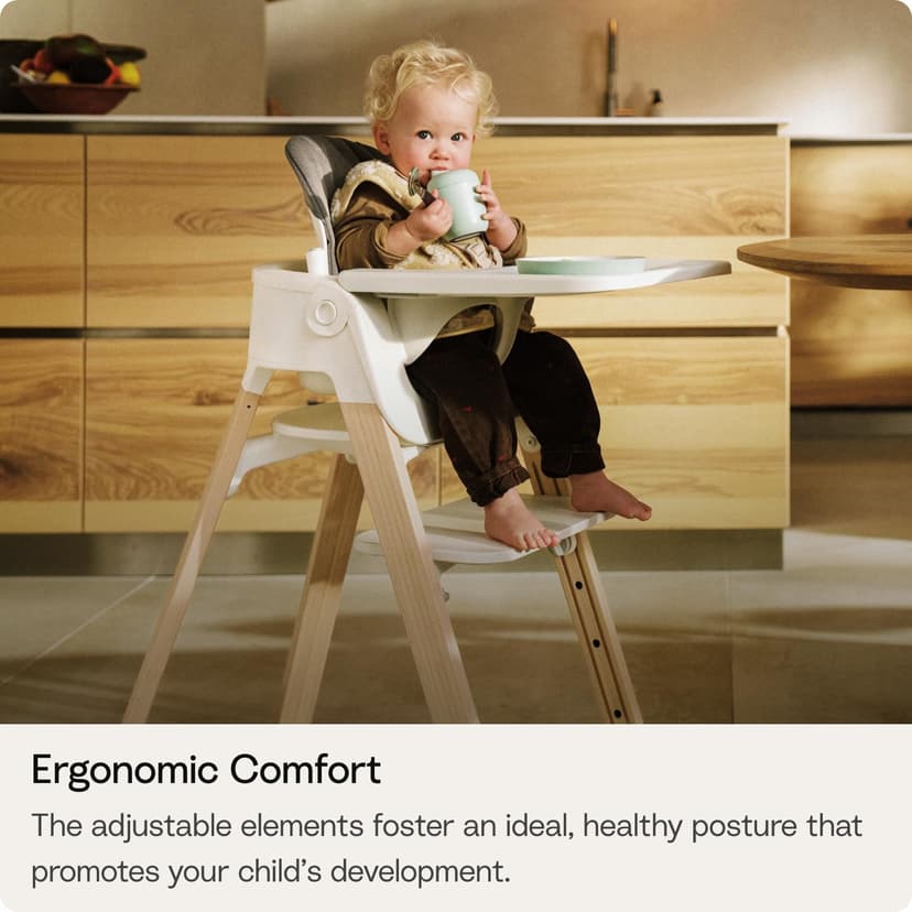Stokke Steps High Chair for Babies & Children from 6 Months to 10 Years – 2-in-1 Adjustable & Ergonomic Design – Removable Baby Set, Tray & Safety Harness – 18.9 x 24.4 x 34.7 – White/Natural