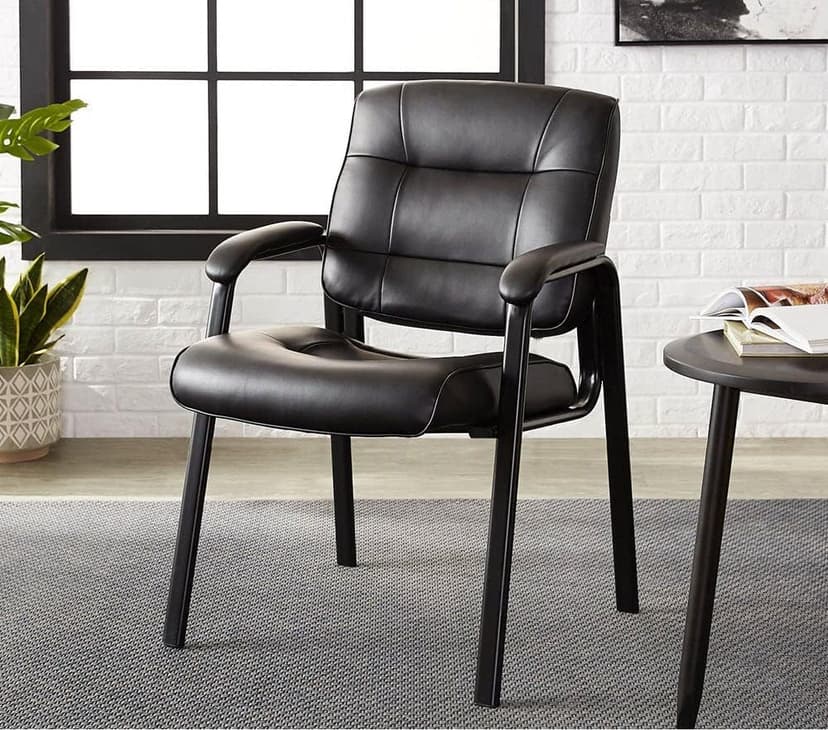 Amazon Basics Classic Faux Leather Office Desk Chair with Armrests, Metal Frame, Black, 27.4D x 23.6W x 35.8H in
