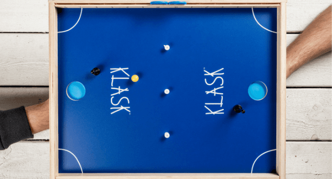 KLASK: The Magnetic Award-Winning Party Game of Skill - for Kids and Adults of All Ages That’s Half Foosball, Half Air Hockey