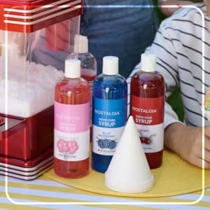 Nostalgia Snow Cone Shaved Ice Machine - Retro Table-Top Slushie Machine Makes 20 Icy Treats - Includes 2 Reusable Plastic Cups & Ice Scoop - Retro Red