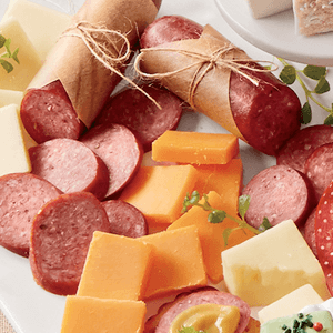 The Swiss Colony 25 Holiday Favorites – Summer Sausage Meats and Cheeses, Assorted Chocolates, and Spreadables, Sweet and Savory Treats, Gift for Holidays, Christmas, or Birthdays, Food Gift Box
