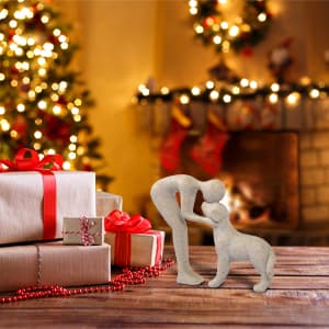 abstract sculpture celebrating the bond between person and pet. Intimate head-to-head Touching memory keepsake for dog lovers Abstract Person and Dog Head-to-Head Figurine Sandstone B0D9JVYT9V