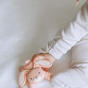 Itzy Ritzy - Ritzy Teether for Molars - Massages Sore Gums & Reaches Back Molars - Silicone Baby Teething Toy with Multiple Textures & Flexible Design - Teething Relief for 3 Months & Up (Puppy)