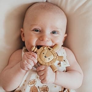 Itzy Ritzy - Ritzy Teether for Molars - Massages Sore Gums & Reaches Back Molars - Silicone Baby Teething Toy with Multiple Textures & Flexible Design - Teething Relief for 3 Months & Up (Puppy)