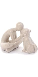 abstract sculpture celebrating the bond between person and pet. Intimate head-to-head Touching memory keepsake for dog lovers Abstract Person and Dog Head-to-Head Figurine Sandstone B0D9JVYT9V