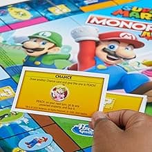 Monopoly Junior Super Mario Edition Board Game, Fun Kids' Ages 5 and Up, Explore The Mushroom Kingdom as Mario, Peach, Yoshi, or Luigi (Amazon Exclusive)
