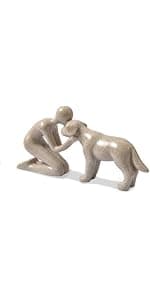 abstract sculpture celebrating the bond between person and pet. Intimate head-to-head Touching memory keepsake for dog lovers Abstract Person and Dog Head-to-Head Figurine Sandstone B0D9JVYT9V