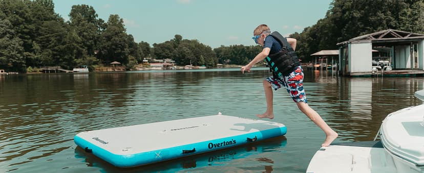 Overton's Universal Adult Life Jacket - Pack of 4, Nylon Shell with Closed-Cell Foam, Open Sides and Sturdy Belts, USCG Approved Type III, Fits Chest Sizes 30" to 52", Includes Zippered Storage Bag