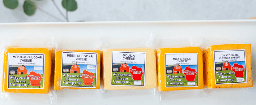 Wisconsin Cheese Company - Specialty 100% Wisconsin Cheese Block Assortment Sampler - (Pack of 7 Blocks) Cheddar, Pepper Jack, Swiss, Gouda, Salami, Smoked Cheddar & Tomato Basil | Locally Sourced | Perfect for Parties, Charcuterie Boards and Birthday Gifts | Great Birthday Gift for Cheese Lovers