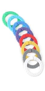Itzy Ritzy Teensy Tube Teether – Textured Hollow Baby Teething Tube That Reaches Front Teeth & Back Molars, Made of Soft Silicone (Pink Rainbow)